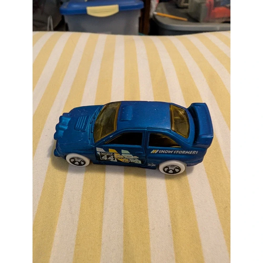 Hot Wheels Ford Escort Rally Blue White Tires 1/64 Diecast 2015 HW Snow Stormers